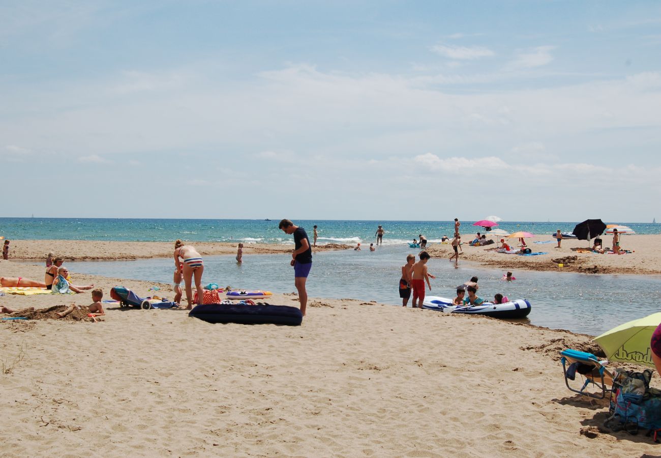 Casa adossada en Torroella de Montgri - Les Dunes 107 - A 60 m de la platja, aire,  piscina i jardí